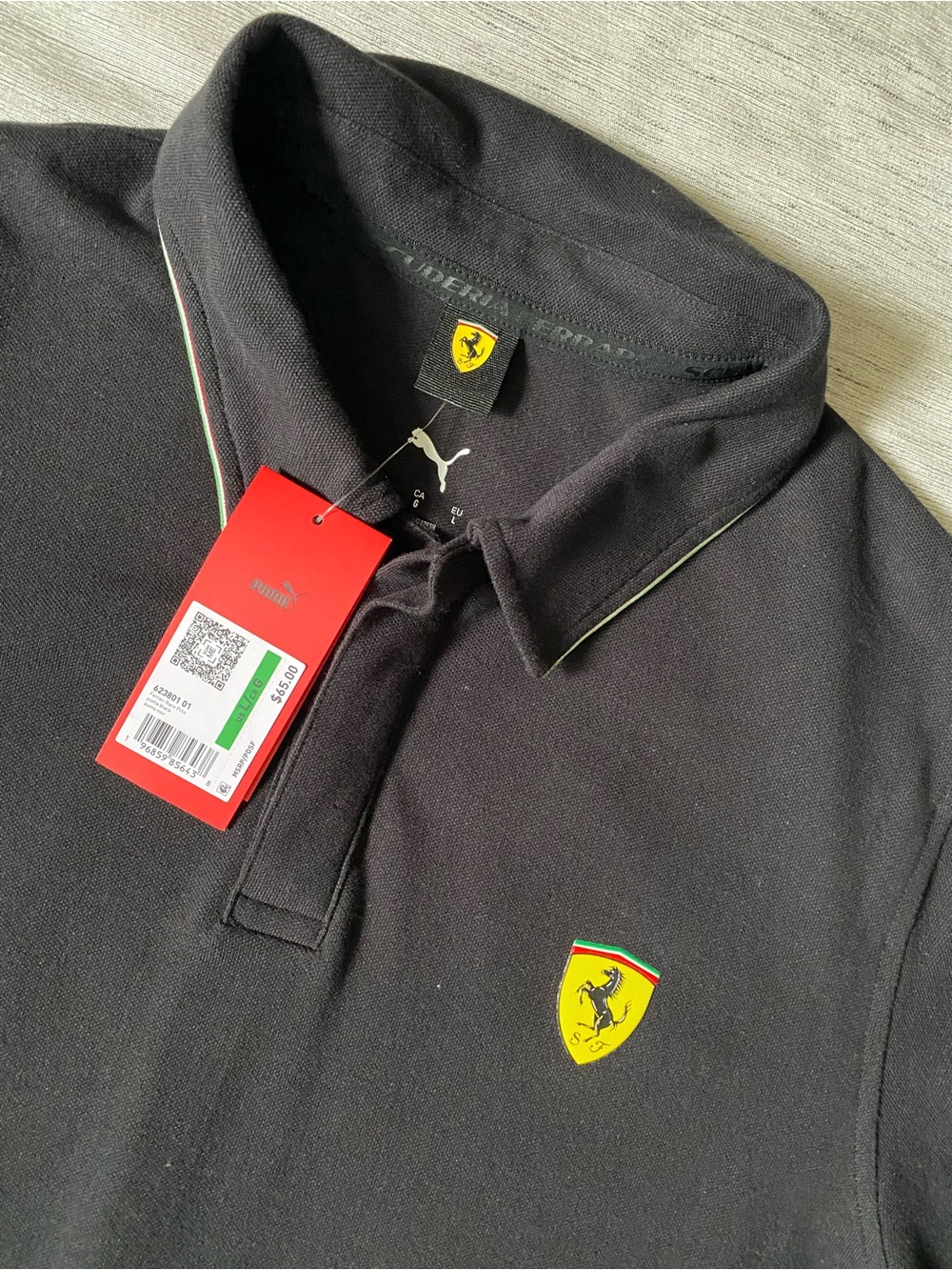 Puma Ferrari Men’s Black Polo with Yellow Shield Emblem